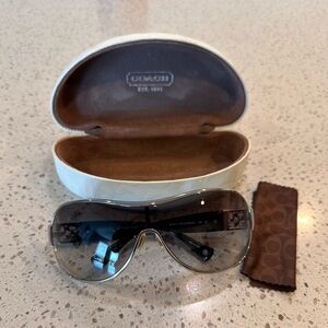 Coach Sunglasses - black and silver frame. With storage case and lens cloth.